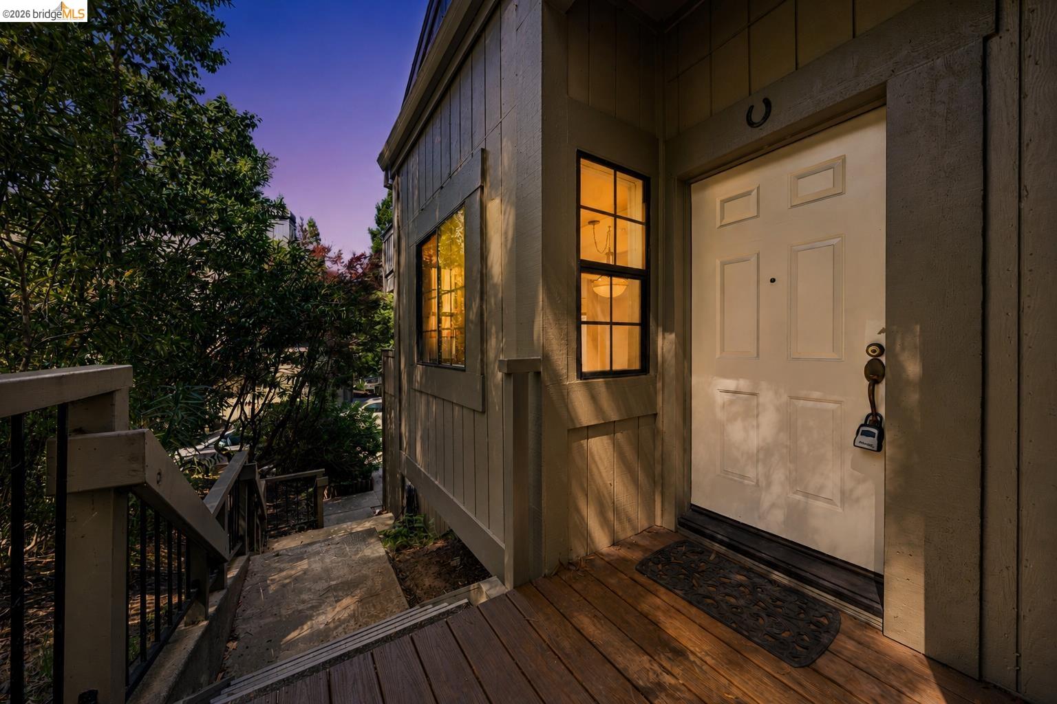 261 Redhawk Road Novato, CA 94949 - Photo 8 of 44 Front entry featuring a white paneled door, black framed window, and composite decking