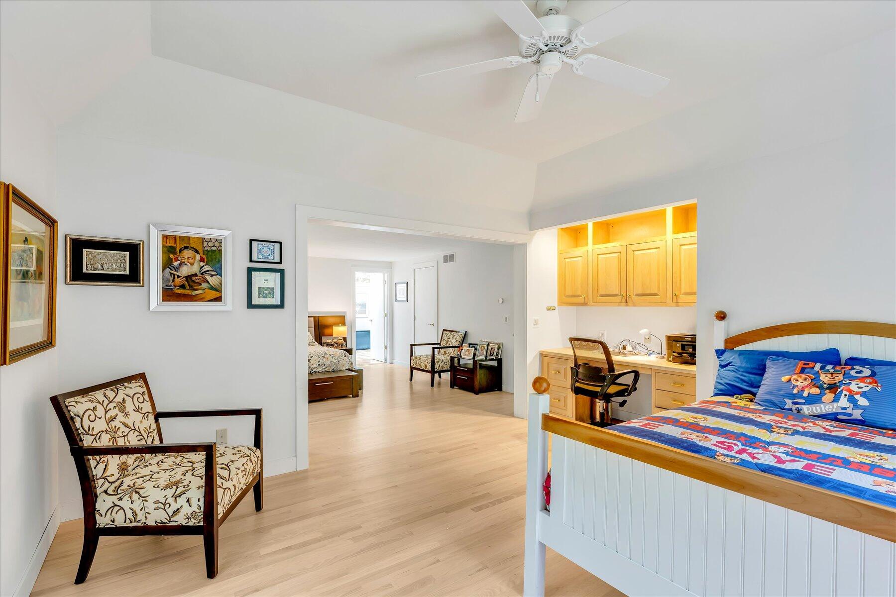 50 Topping Lift Mashpee, MA 02649 - Photo 14 of 32 a bedroom with furniture and a large window