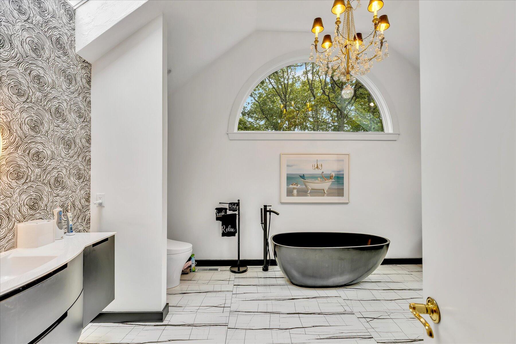 50 Topping Lift Mashpee, MA 02649 - Photo 15 of 32 a view of a room with wooden floor and a potted plant