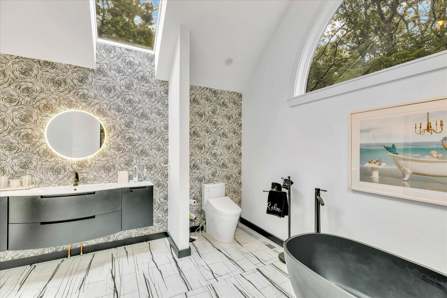 50 Topping Lift Mashpee, MA 02649 - Photo 16 of 32 a bathroom with a sink and a mirror