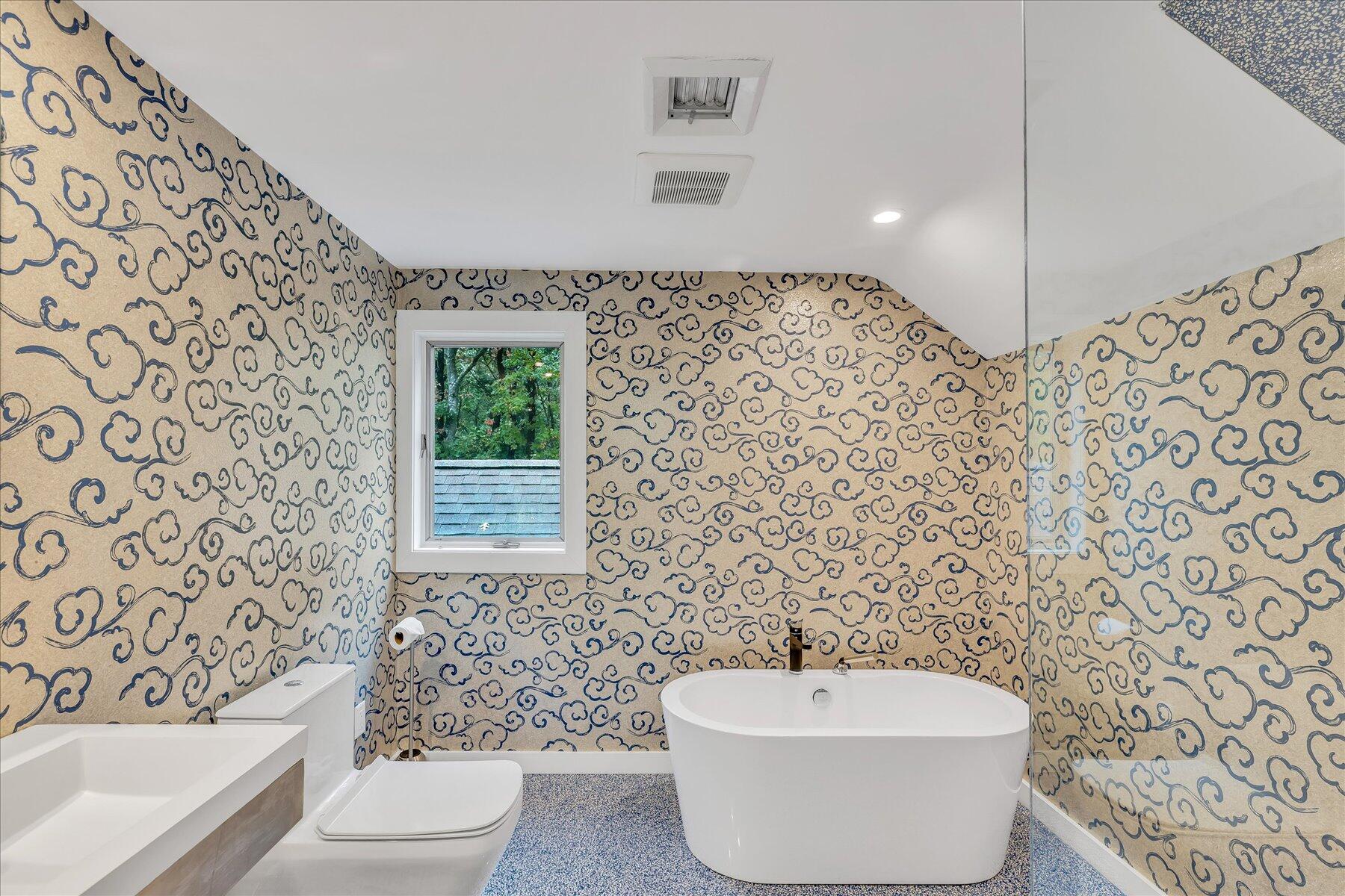 50 Topping Lift Mashpee, MA 02649 - Photo 22 of 32 a bathroom with a toilet and a bathtub