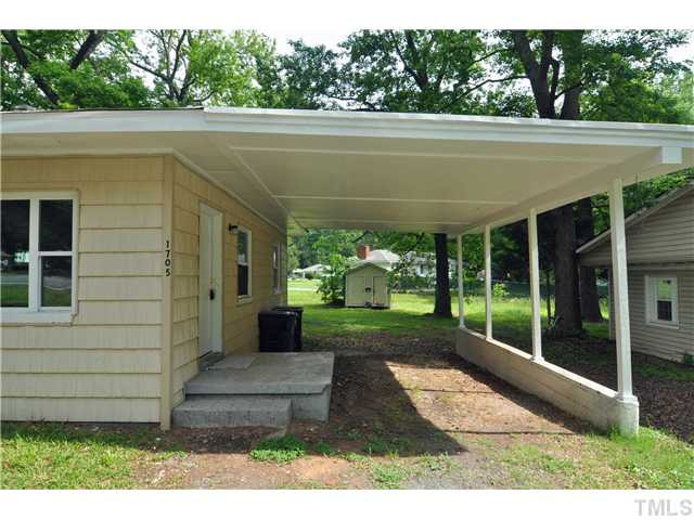 1705 Cheek Road Durham, NC 27704 - Photo 20 of 25 a view of a backyard with garden