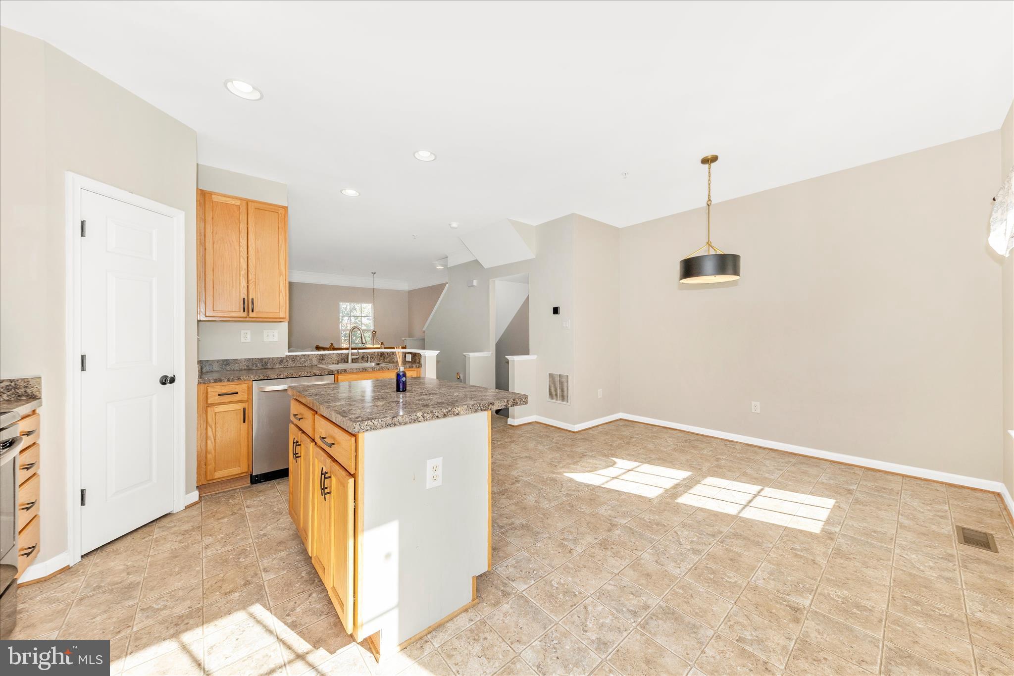 1812 Reading Court Mount Airy, MD 21771 - Photo 15 of 43 a open kitchen with stainless steel appliances granite countertop a sink stove and refrigerator