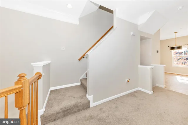 a view of a room with white walls