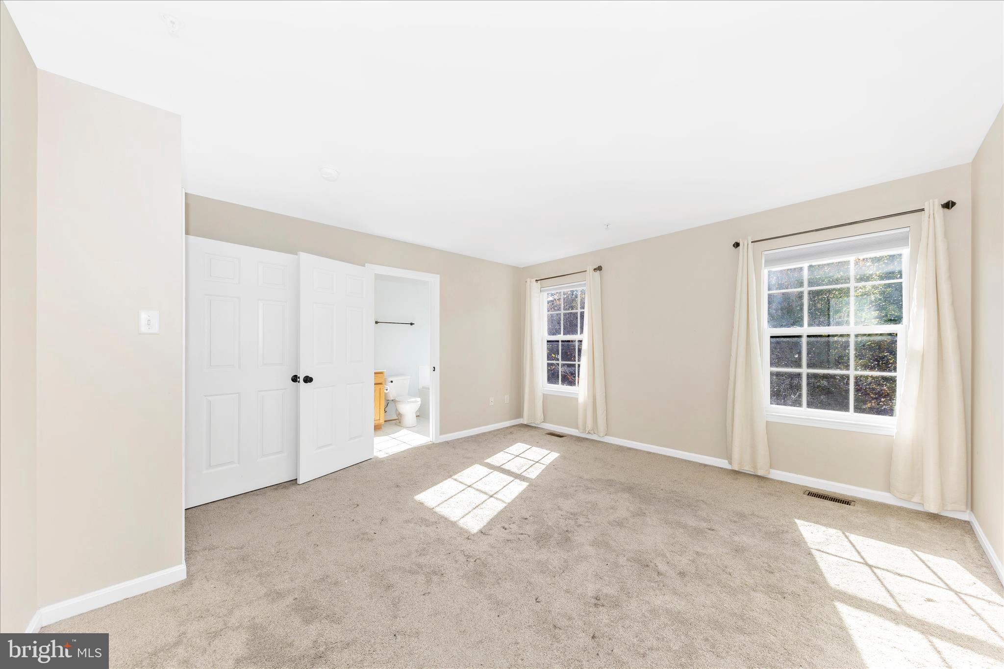 1812 Reading Court Mount Airy, MD 21771 - Photo 22 of 43 an empty room with windows