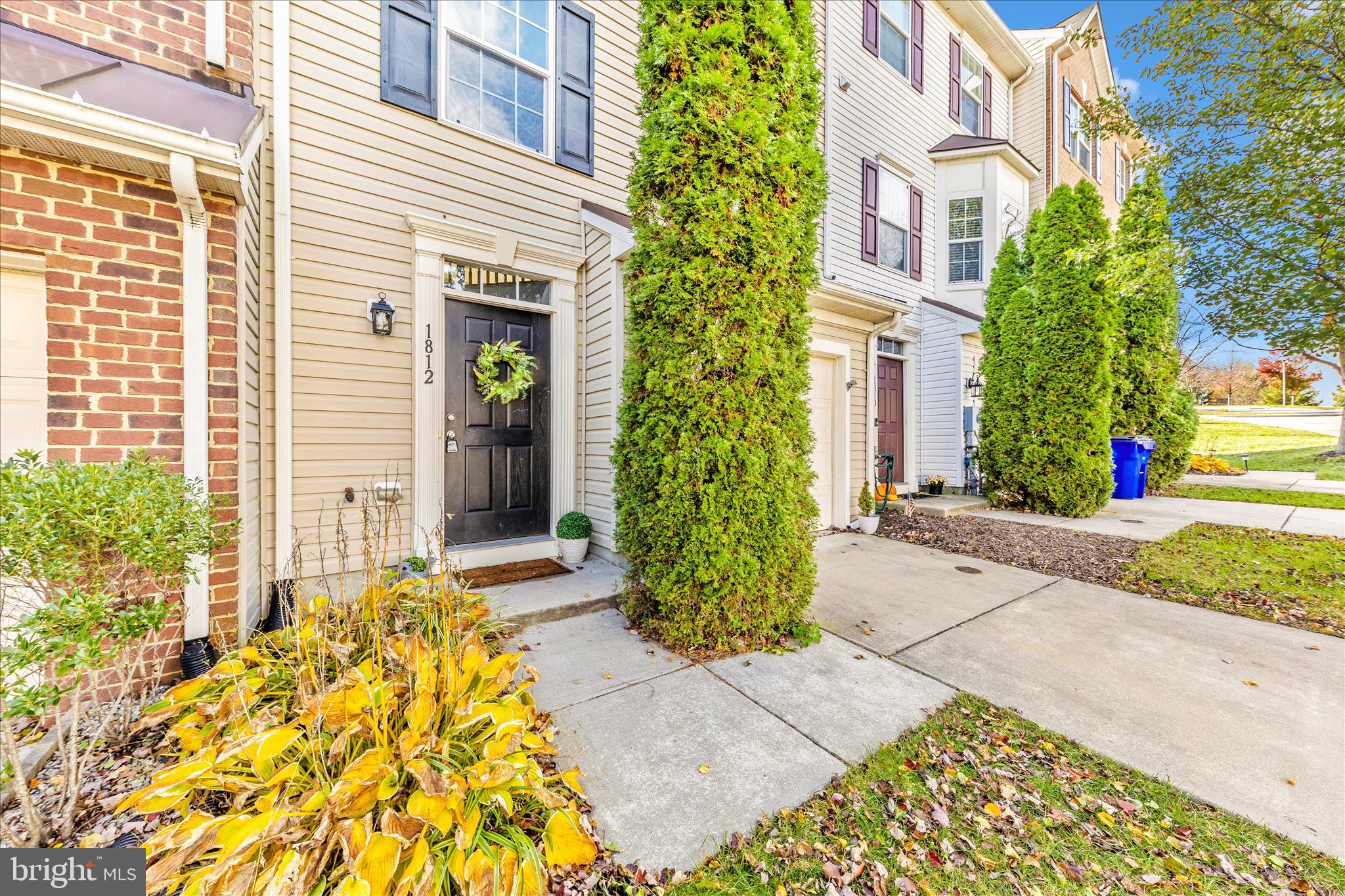 1812 Reading Court Mount Airy, MD 21771 - Photo 3 of 43 a front view of a house with a yard