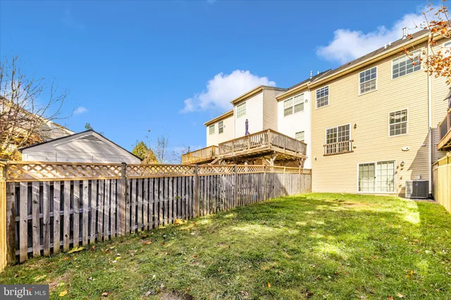 a front view of a house with trees