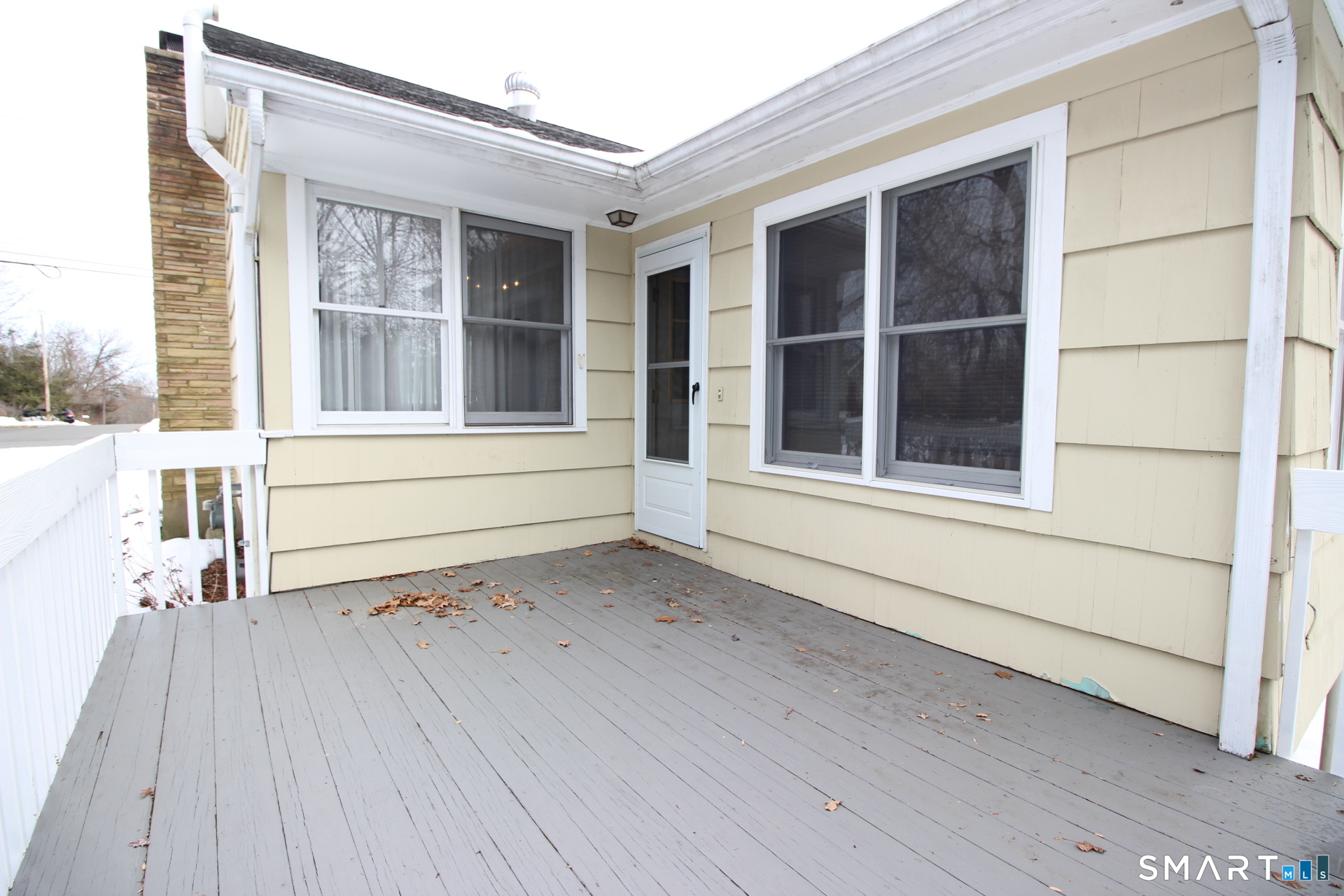76 Elliott Road Trumbull, CT 06611 - Photo 20 of 26 a view of a house with a porch