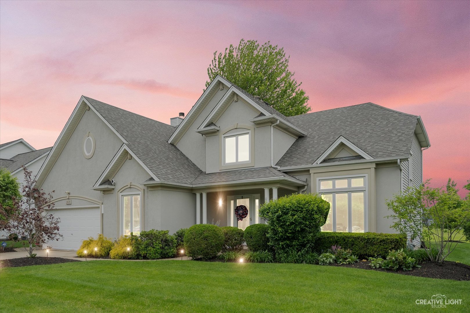 2635 High Meadow Road Naperville, IL 60564 - Photo 6 of 38 a front view of a house with a garden