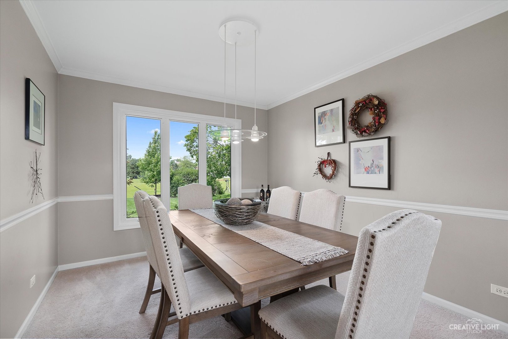 2635 High Meadow Road Naperville, IL 60564 - Photo 8 of 38 a view of a dining room with furniture window and outside view