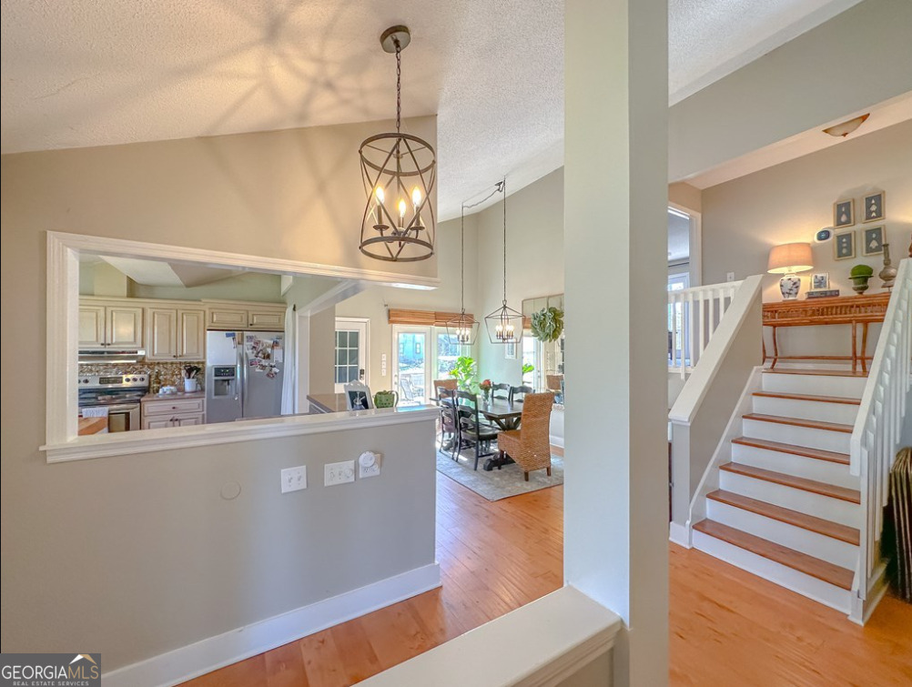 218 Hidden Springs Road Climax, GA 39834 - Photo 12 of 35 a view of a dining room with furniture wooden floor and chandelier