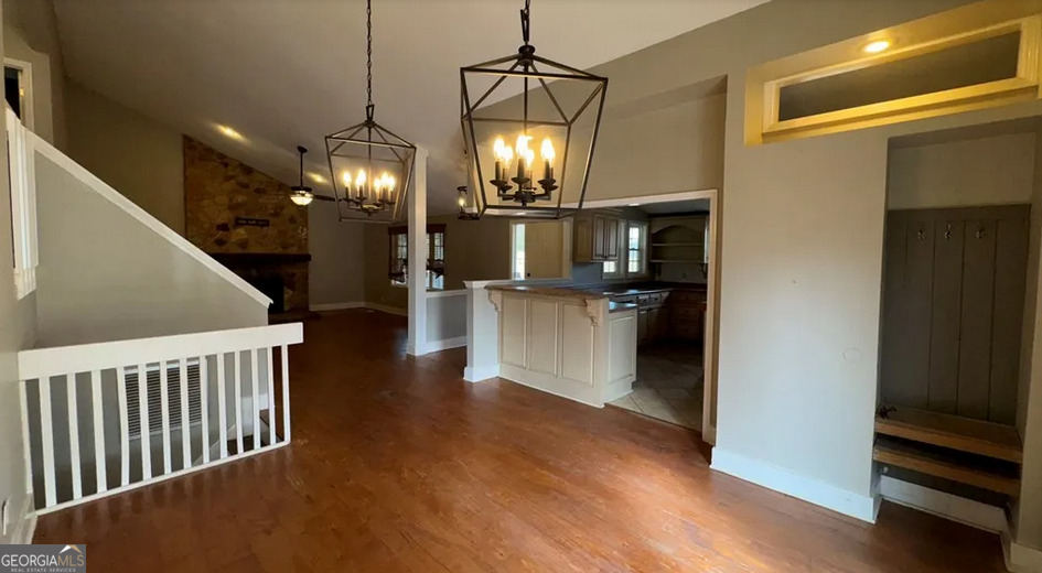 218 Hidden Springs Road Climax, GA 39834 - Photo 13 of 35 a view of a hallway with wooden floor and staircase