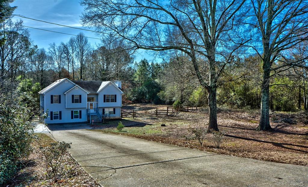 236 Hiram Sudie Road Dallas, GA 30157 - Photo 1 of 1 a house view with a outdoor space