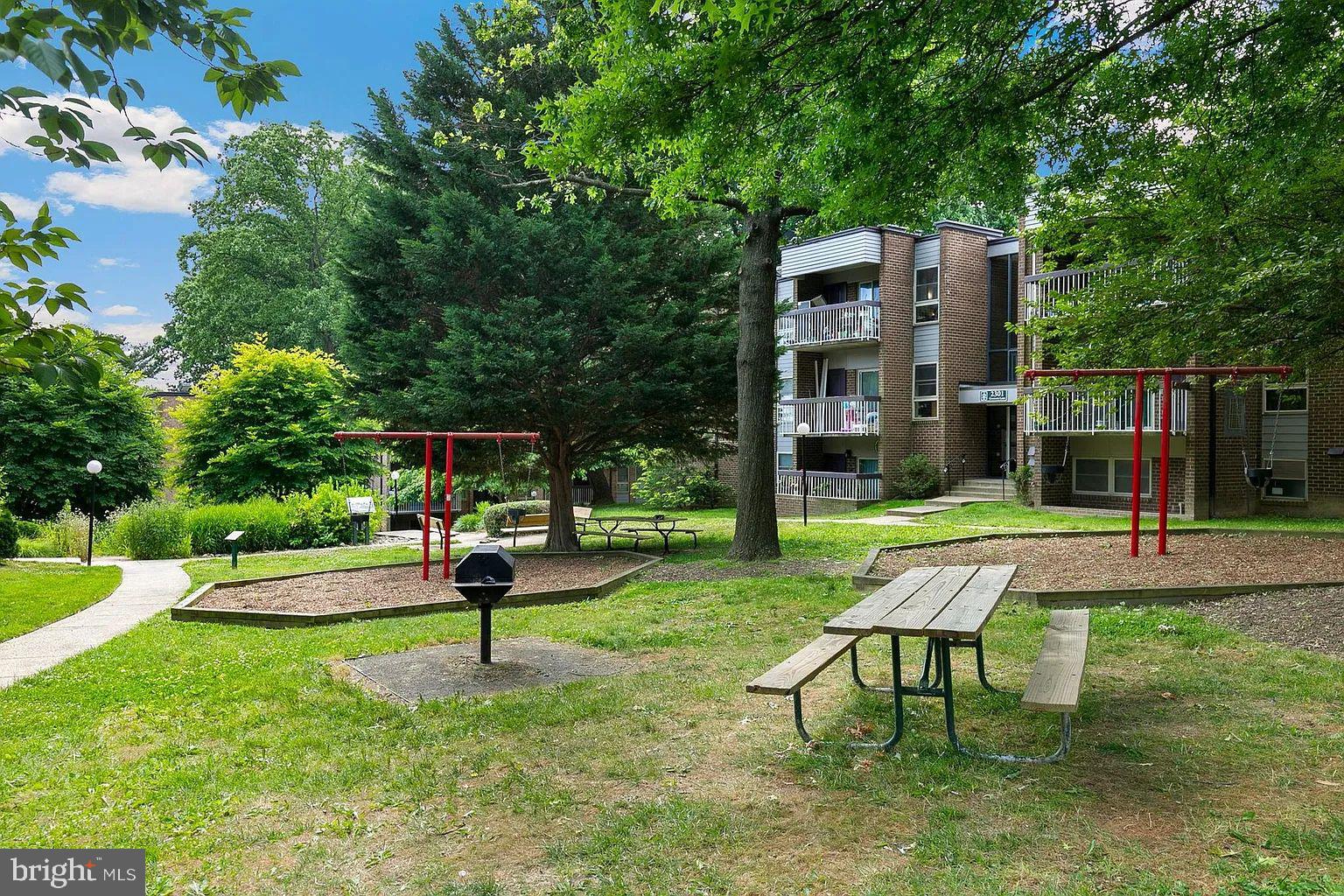 2305 Greenery Lane, Unit 1023 Silver Spring, MD 20906 - Photo 21 of 23 a view of a park with furniture