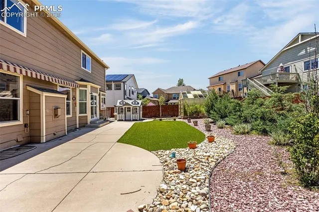 a view of a building with a yard