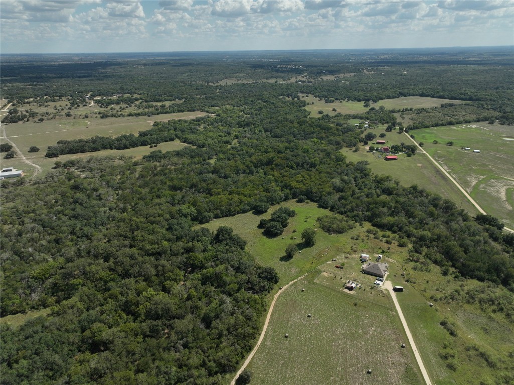 Tbd Lot 4 Brushy Branch Road Lockhart, TX 78644 - Photo 5 of 10 an aerial view of a house with a yard