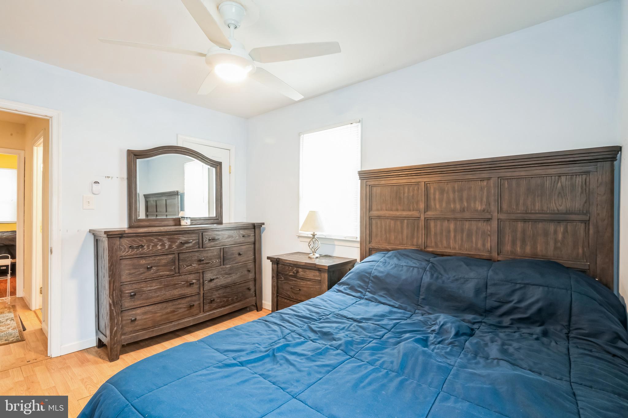 13 Paula Lane Villas, NJ 08251 - Photo 12 of 30 a bed room with a bed and a dresser