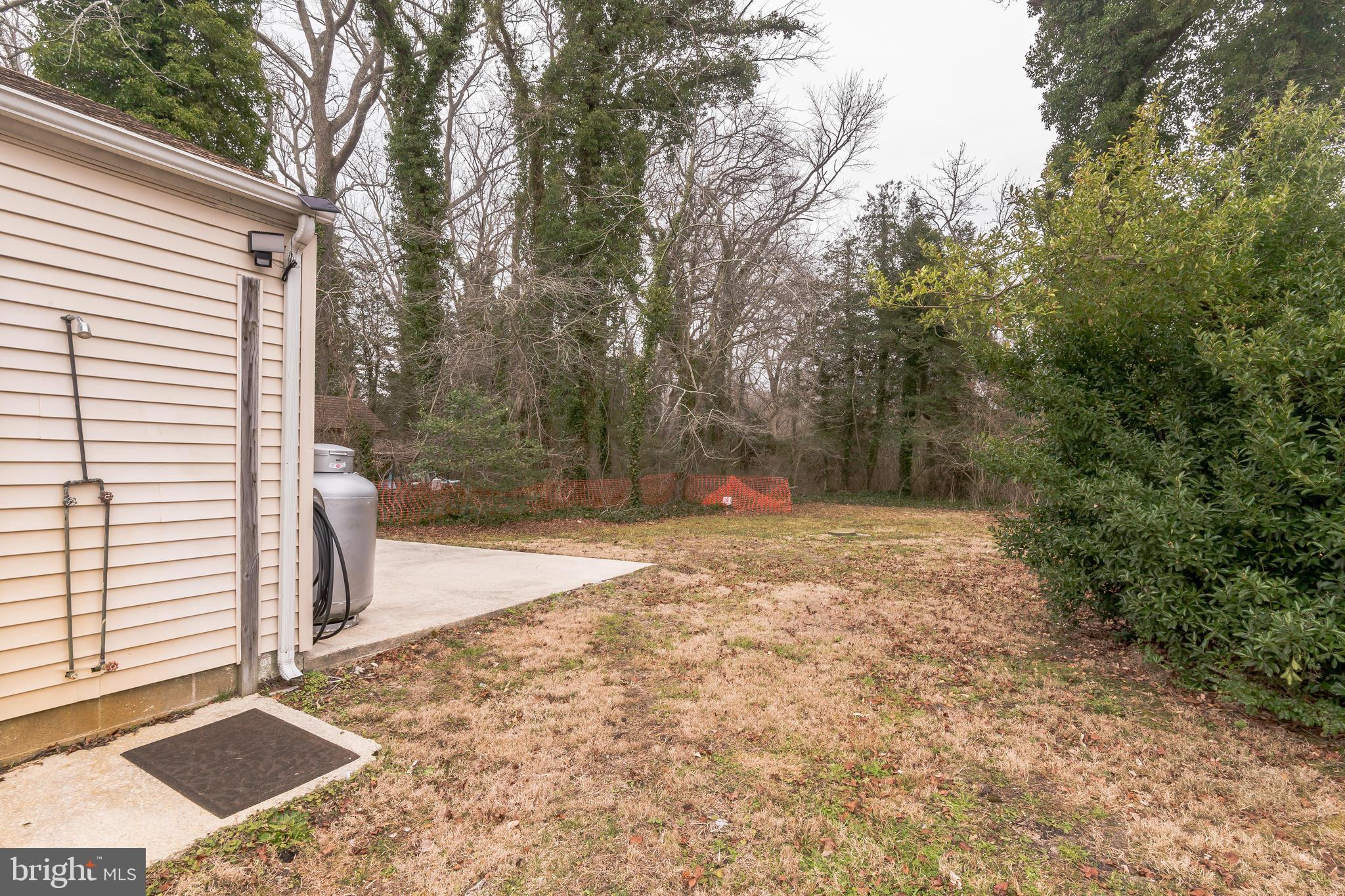 13 Paula Lane Villas, NJ 08251 - Photo 2 of 30 a backyard of a house with lots of green space