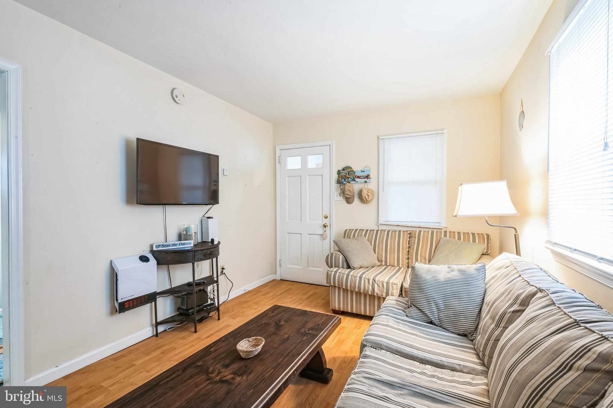 13 Paula Lane Villas, NJ 08251 - Photo 26 of 30 a living room with furniture and a flat screen tv