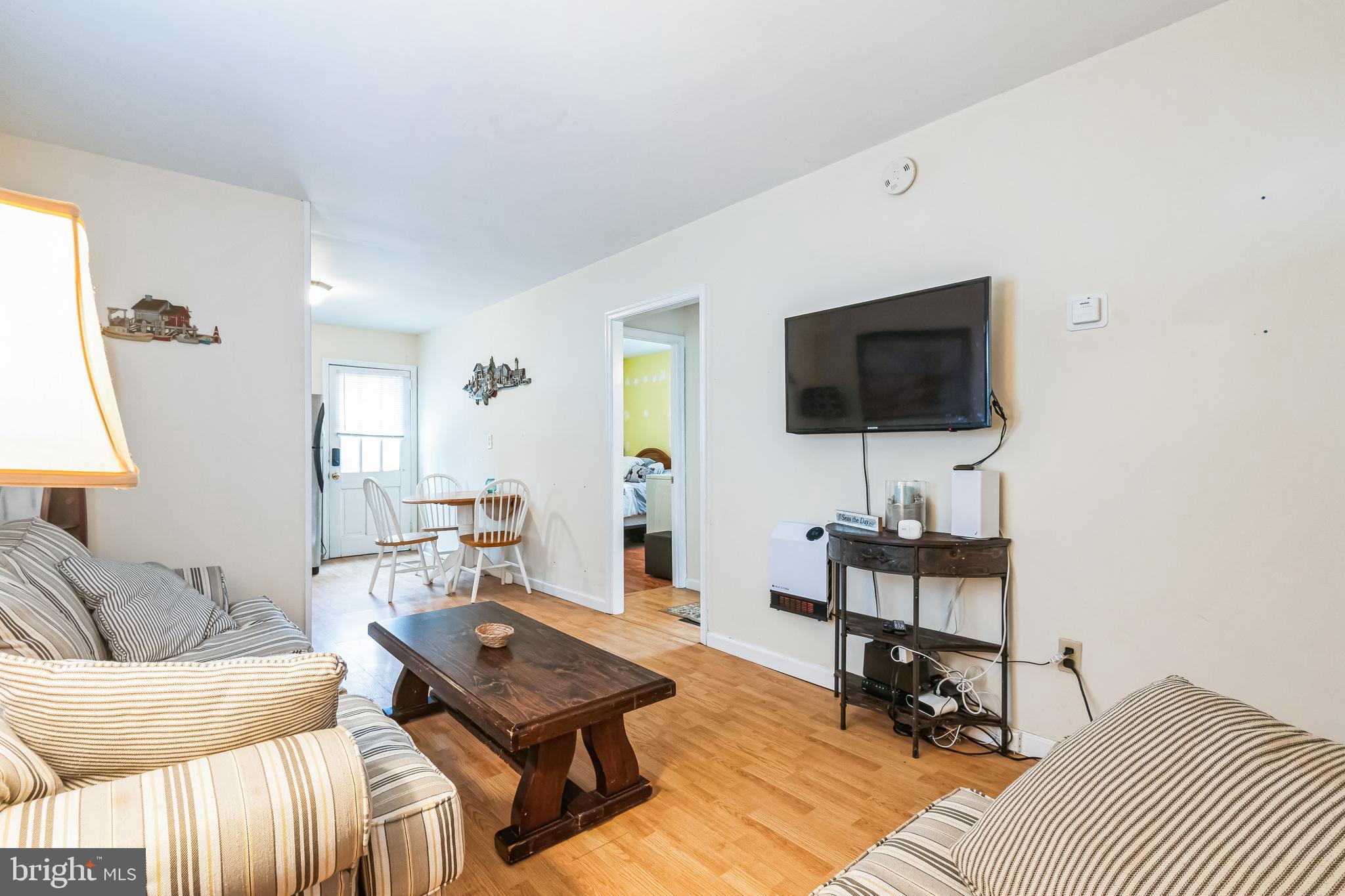 13 Paula Lane Villas, NJ 08251 - Photo 27 of 30 a living room with furniture and a flat screen tv