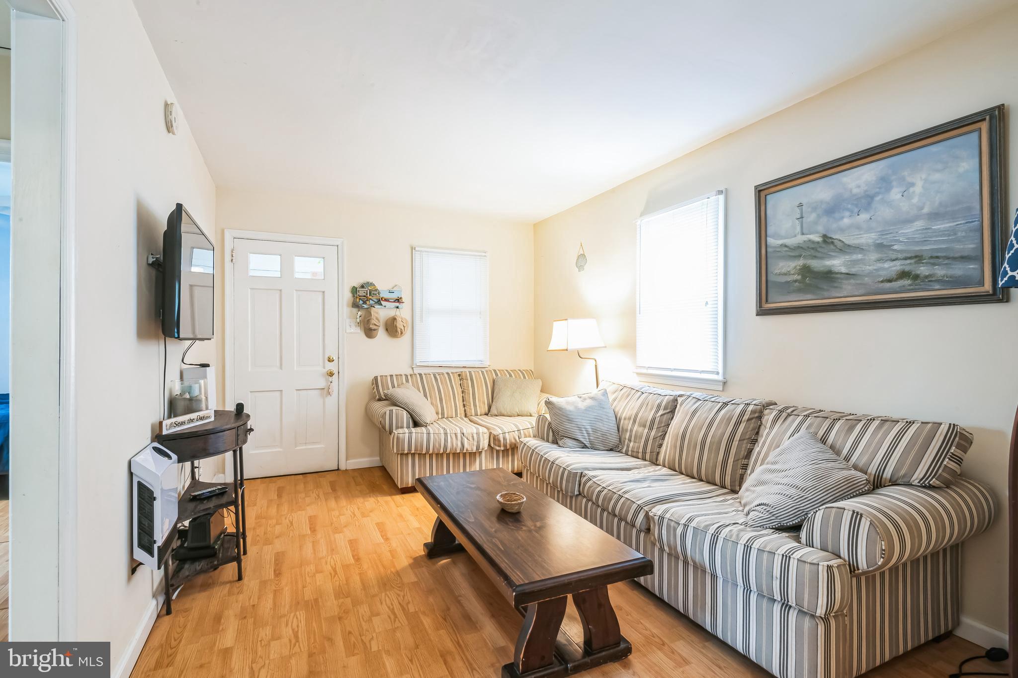 13 Paula Lane Villas, NJ 08251 - Photo 7 of 30 a living room with furniture and a flat screen tv