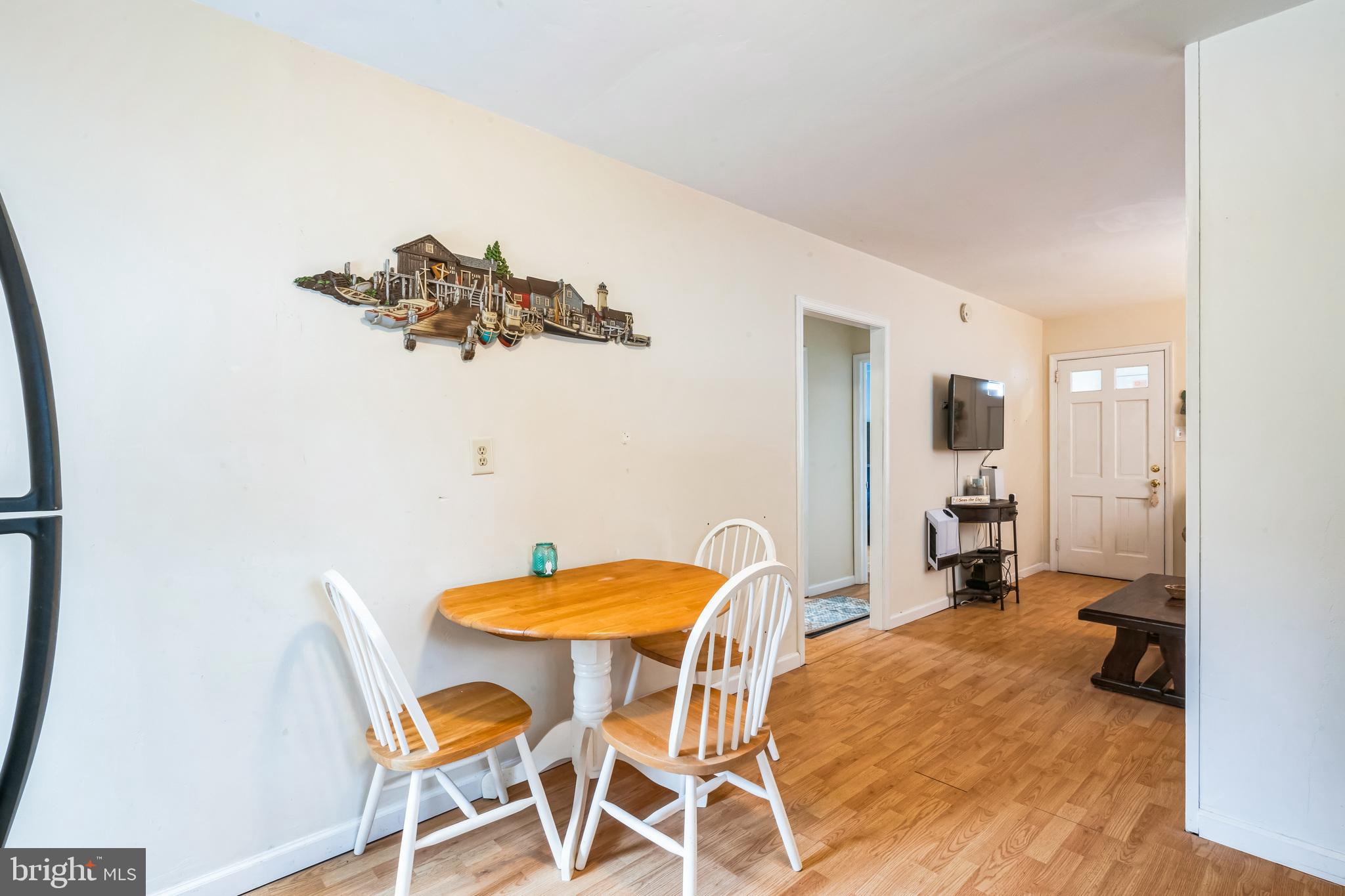 13 Paula Lane Villas, NJ 08251 - Photo 9 of 30 a view of a dining room with furniture and a chandelier