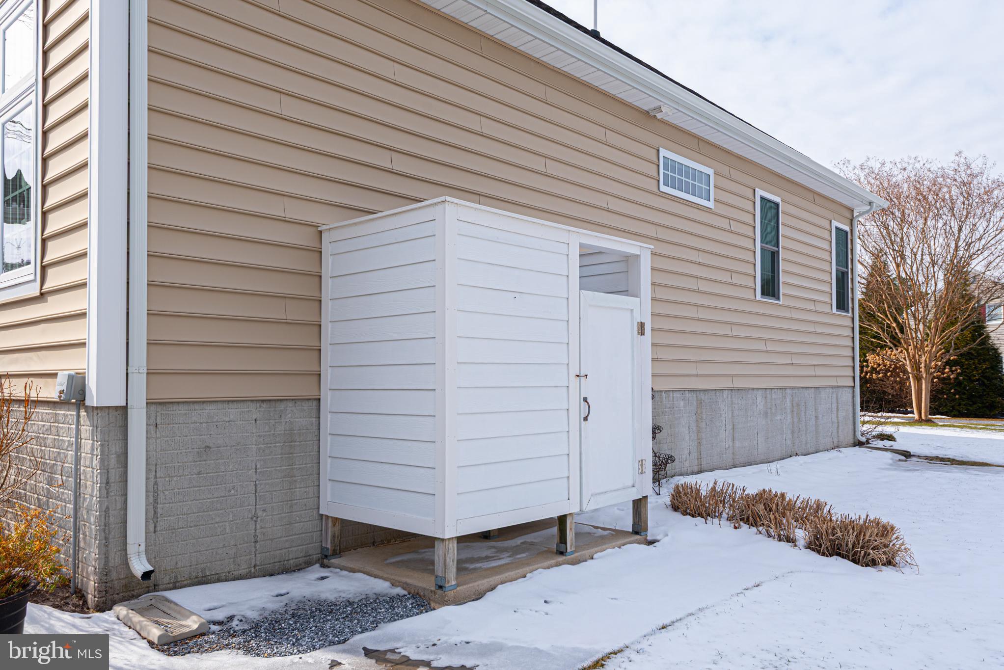 7 Longview Drive Ocean View, DE 19970 - Photo 80 of 125 Paver walkway to outdoor shower.