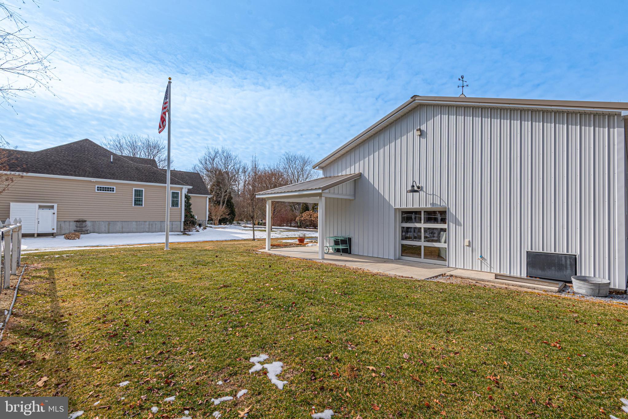 7 Longview Drive Ocean View, DE 19970 - Photo 92 of 125 Glass garage door opens to side porch.