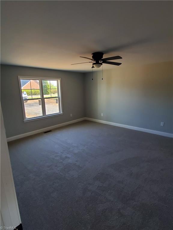 7905 Lester Road Stokesdale, NC 27357 - Photo 5 of 8 Master Bedroom