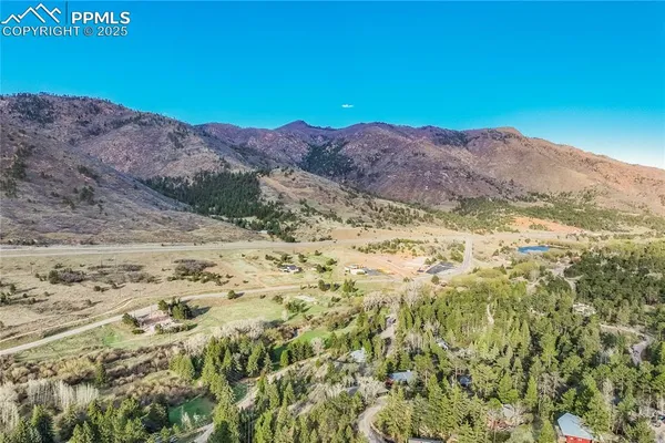 a view of mountains and valleys