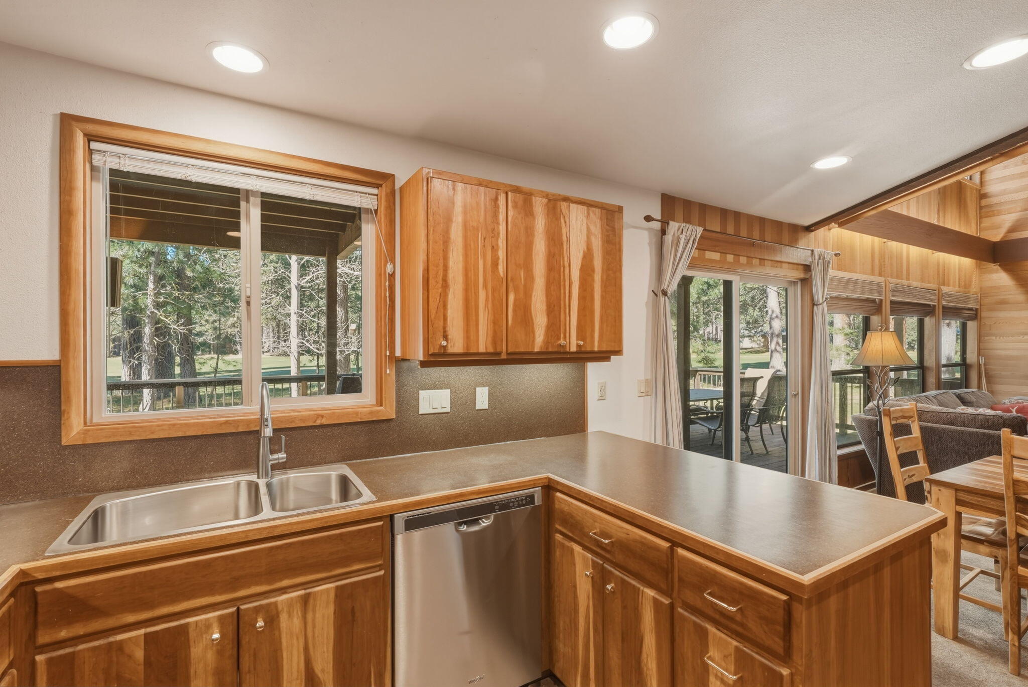 13137 Hawks Beard, Unit GH 129 Black Butte Ranch, OR 97759 - Photo 10 of 57 a kitchen that has a sink and a large window