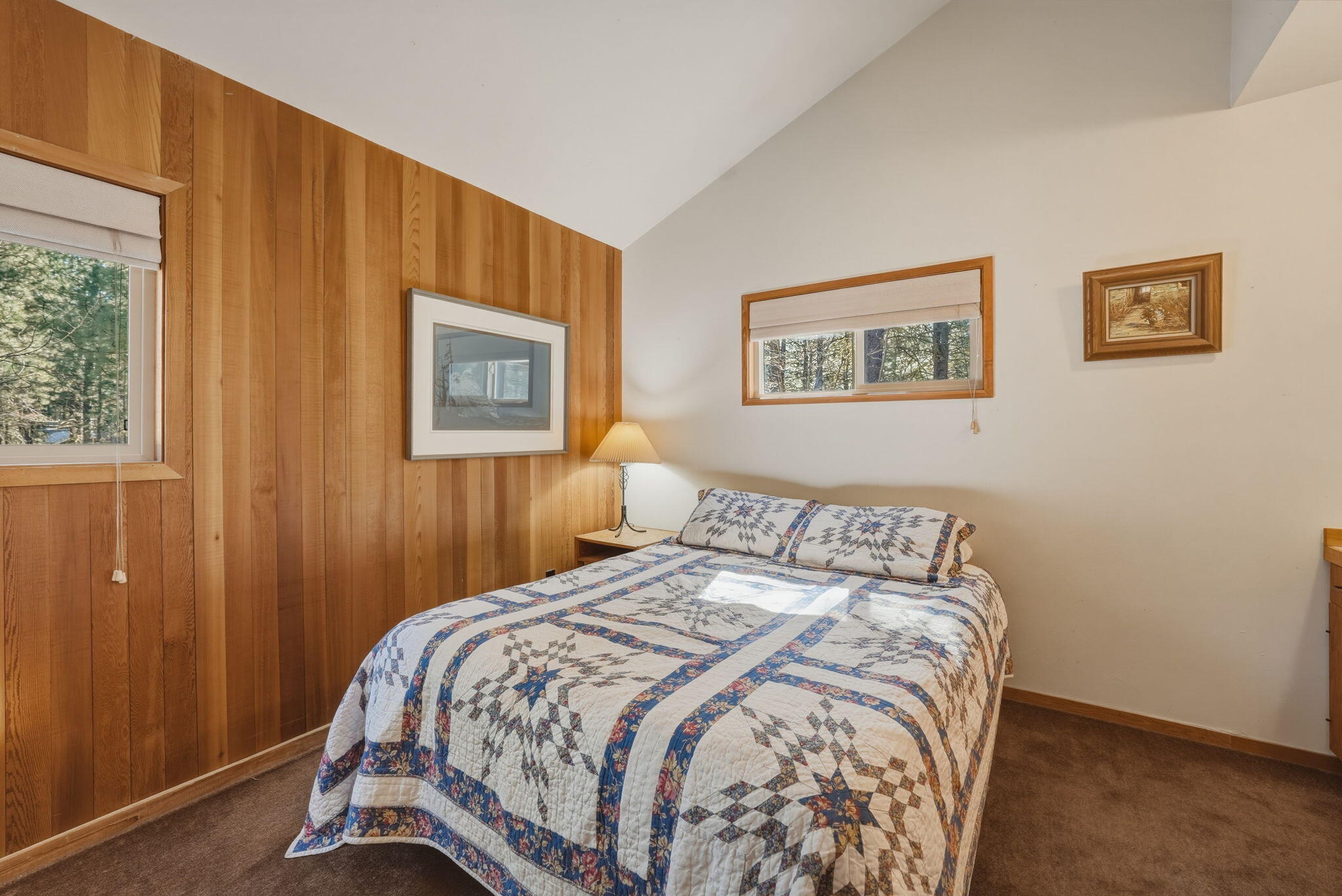 13137 Hawks Beard, Unit GH 129 Black Butte Ranch, OR 97759 - Photo 21 of 57 a bedroom with a bed and a window
