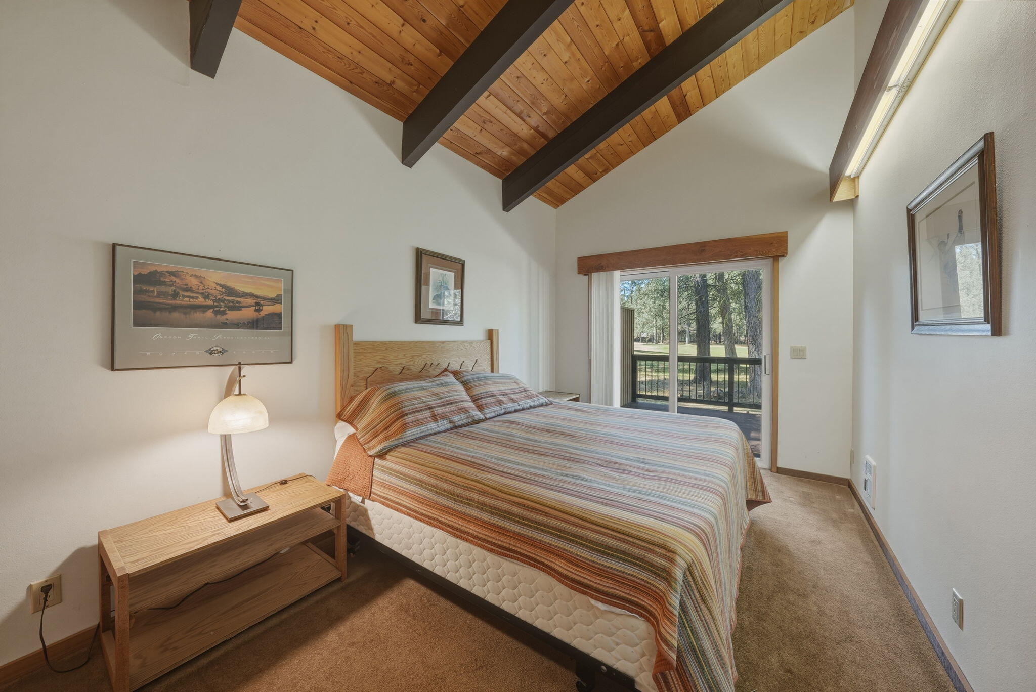 13137 Hawks Beard, Unit GH 129 Black Butte Ranch, OR 97759 - Photo 27 of 57 a bedroom with a bed and a window