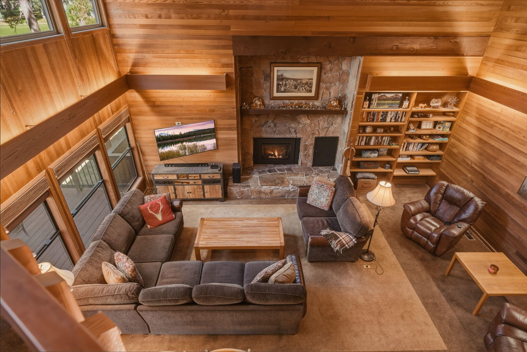 13137 Hawks Beard, Unit GH 129 Black Butte Ranch, OR 97759 - Photo 32 of 57 a living room with furniture and a fireplace