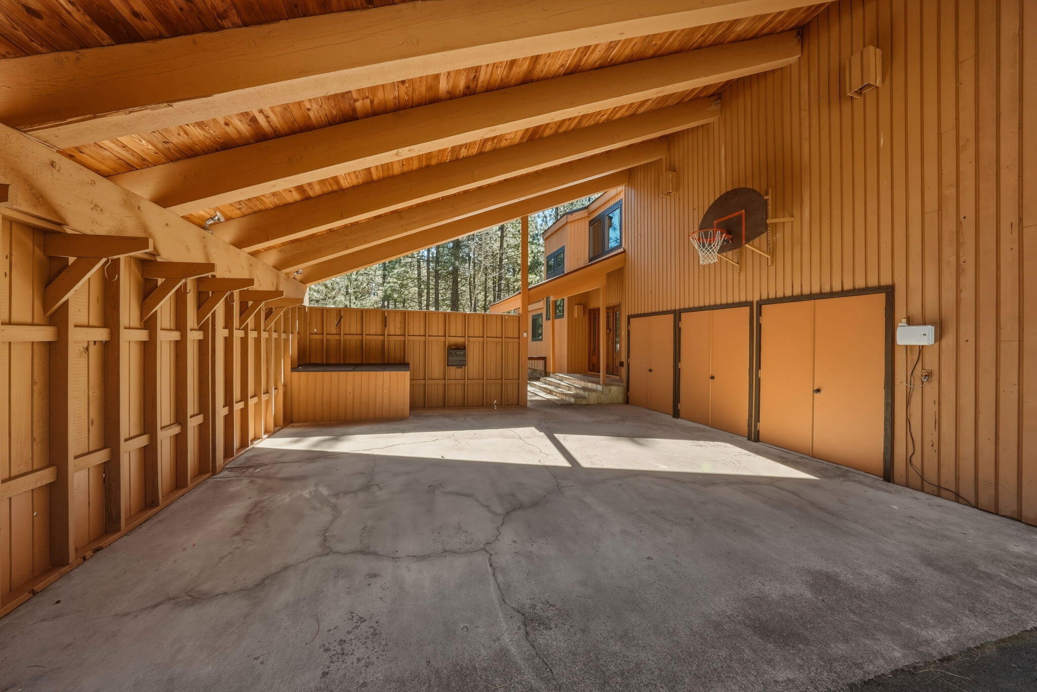 13137 Hawks Beard, Unit GH 129 Black Butte Ranch, OR 97759 - Photo 52 of 57 a view of a garage with wooden walls