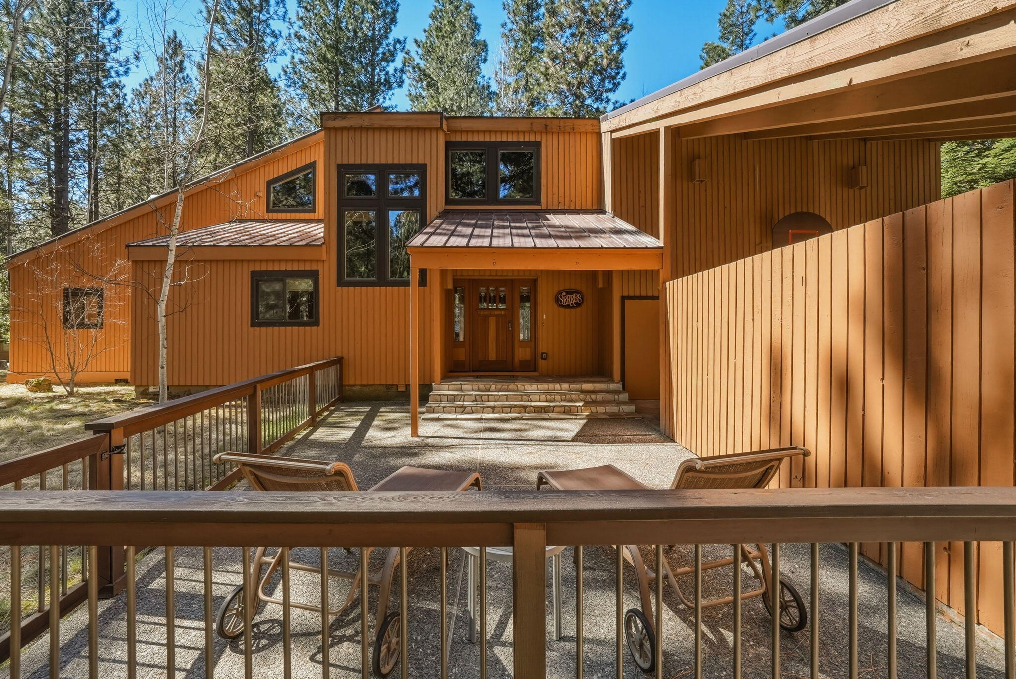 13137 Hawks Beard, Unit GH 129 Black Butte Ranch, OR 97759 - Photo 54 of 57 a front view of a house with a garden and plants