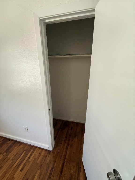 3002 Market Street, Unit 4 Houston, TX 77020 - Photo 11 of 13 a view of walk in closet with wooden floor