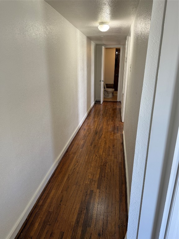 3002 Market Street, Unit 4 Houston, TX 77020 - Photo 7 of 13 a view of a hallway with wooden floor