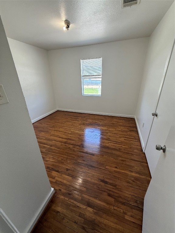 3002 Market Street, Unit 4 Houston, TX 77020 - Photo 10 of 13 a view of a hallway with wooden floor