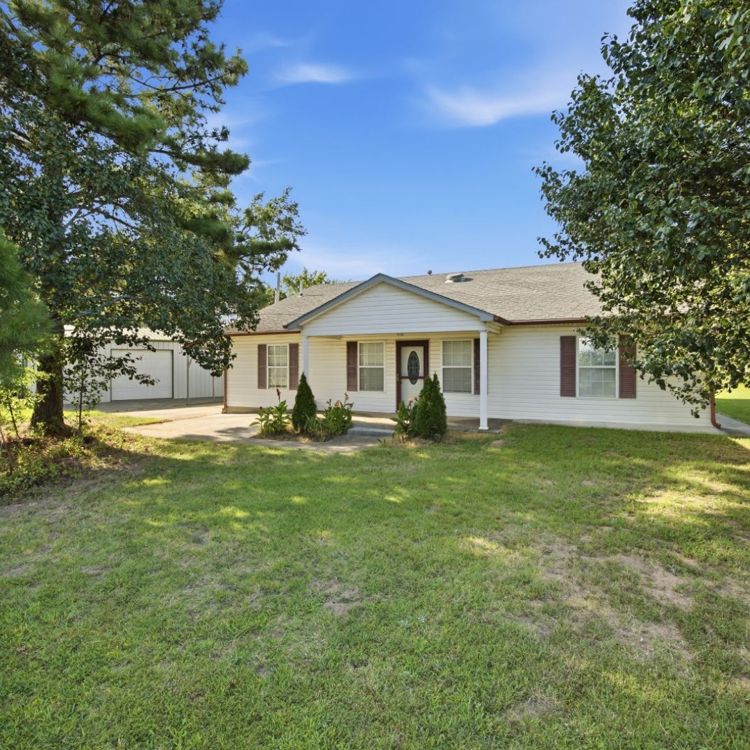 2696 Russellville Road Quinton, OK 74561 - Photo 2 of 40 Ranch-style residence featuring white siding and a covered front porch