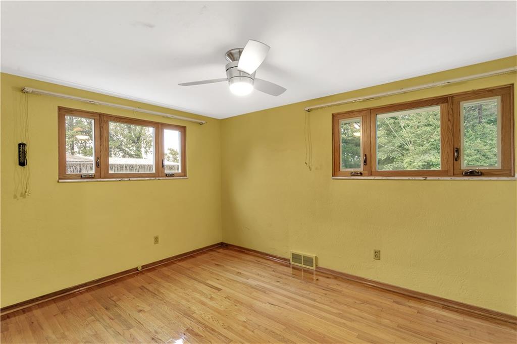 2362 Haymaker Road Monroeville, PA 15146 - Photo 11 of 22 Hardwood floors exposed in bedroom.