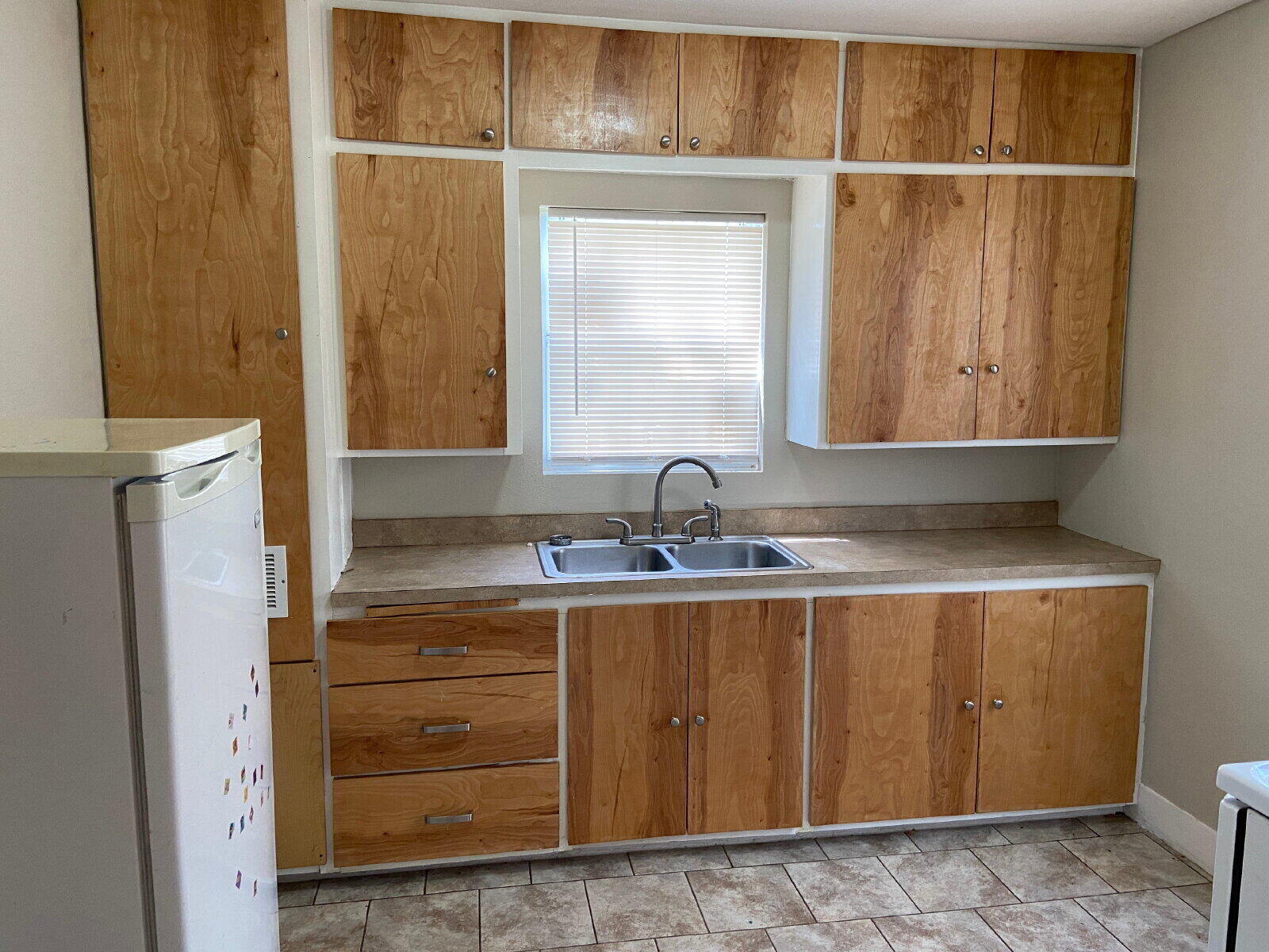 1909 16th Street, Unit REAR Lubbock, TX 79401 - Photo 5 of 9 a bathroom with a sink and a mirror