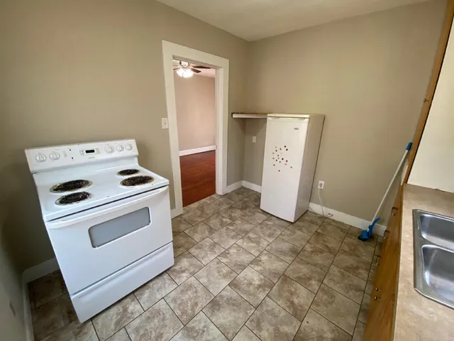 storage and utility room with washer and dryer