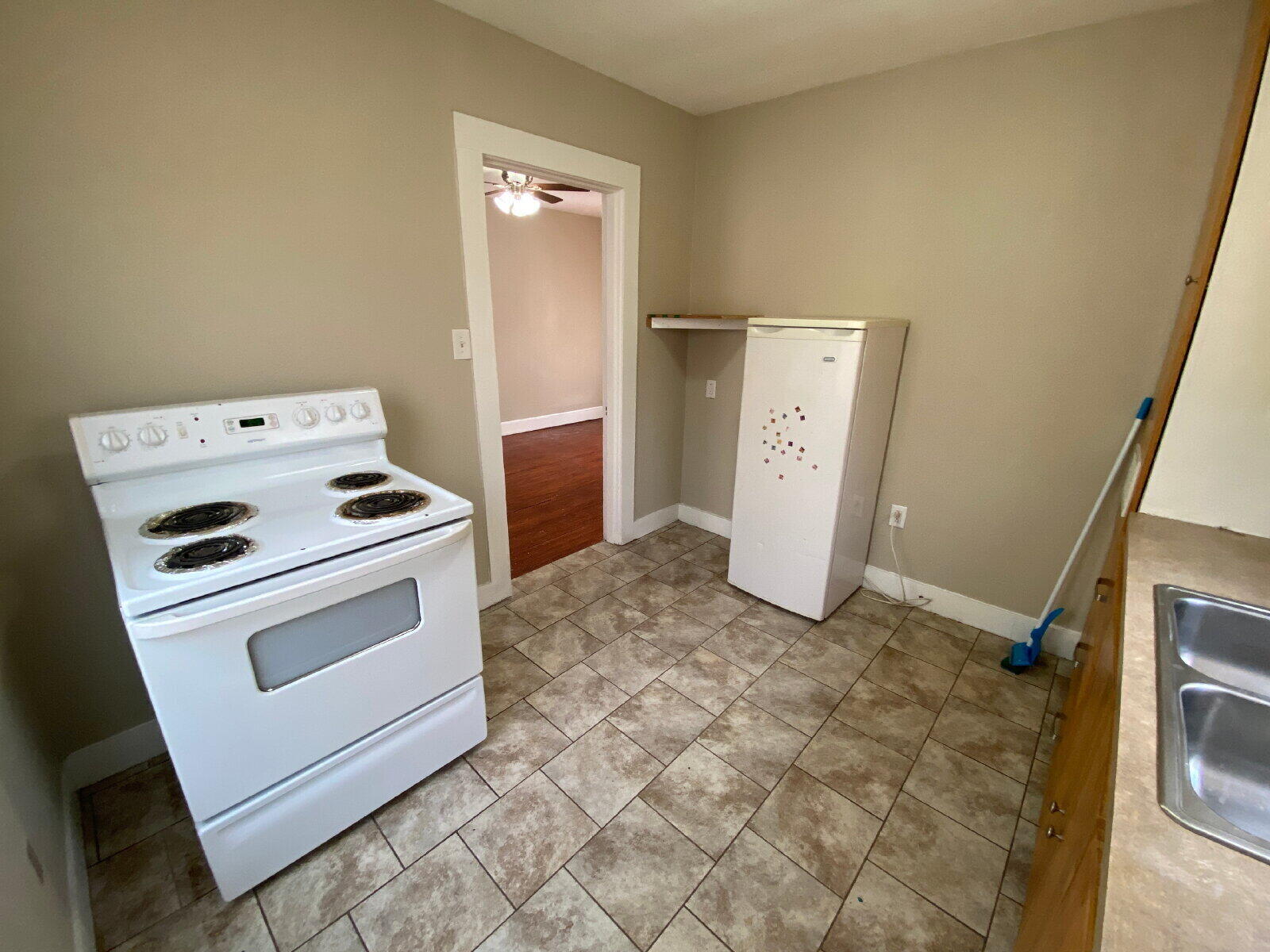 1909 16th Street, Unit REAR Lubbock, TX 79401 - Photo 7 of 9 storage and utility room with washer and dryer