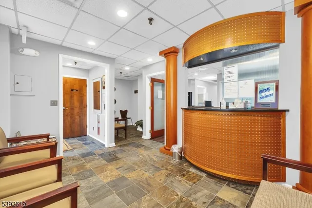 a view of a hallway with bathroom
