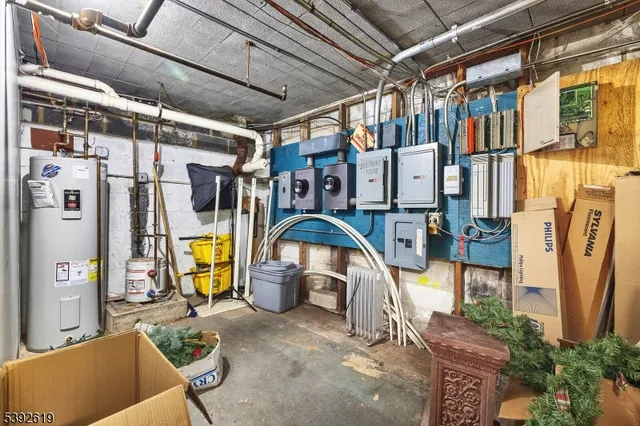 a kitchen that has a lot of cabinets and appliances