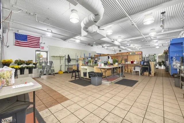 a room with lots of furniture and clutter