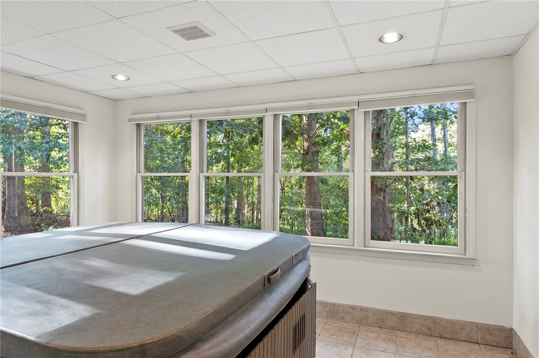 225 Arrowhead Trail Easley, SC 29642 - Photo 22 of 33 Relax in the indoor spa with tranquil views of surrounding nature.