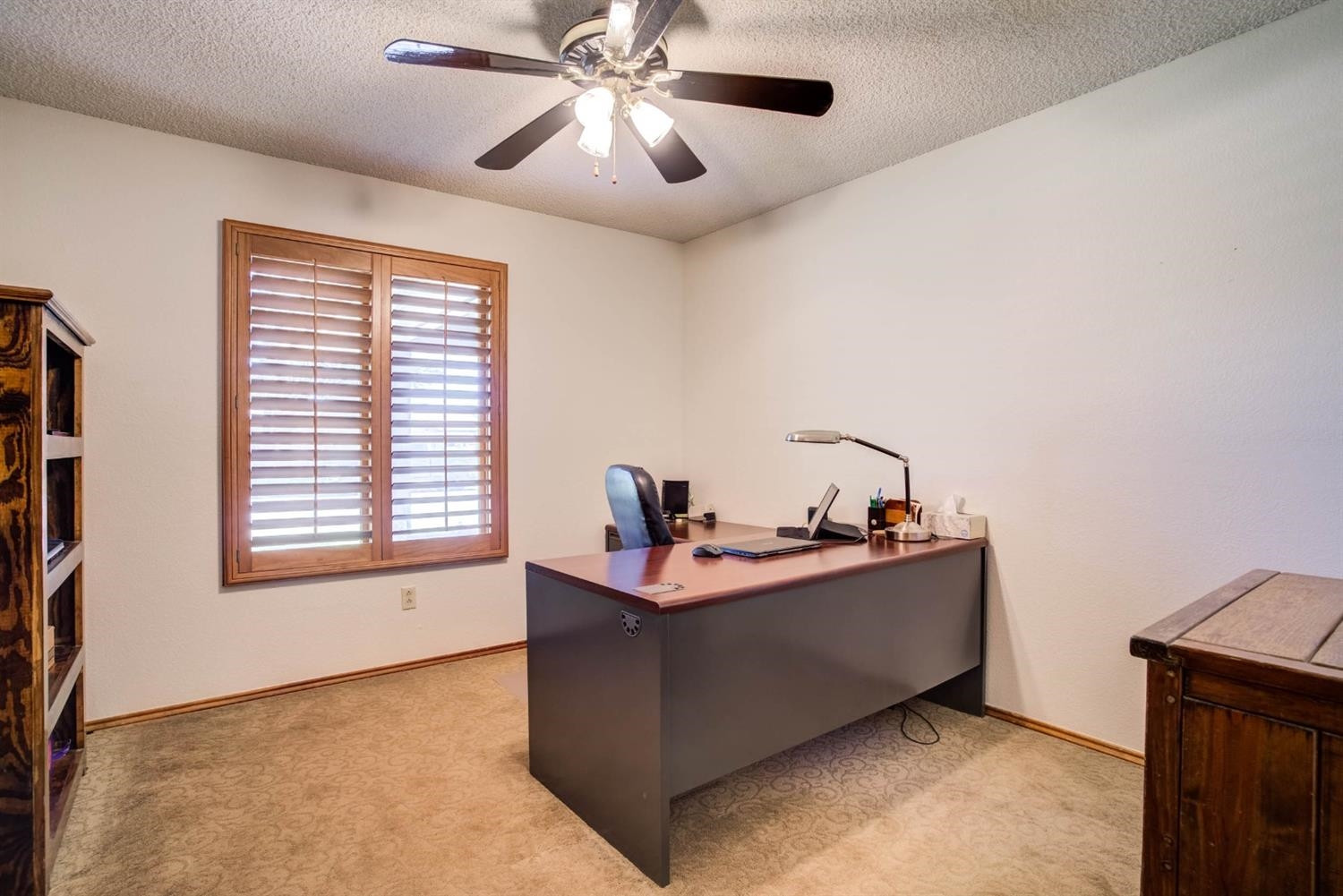 5304 90th Street Lubbock, TX 79424 - Photo 27 of 39 a work room with furniture and window