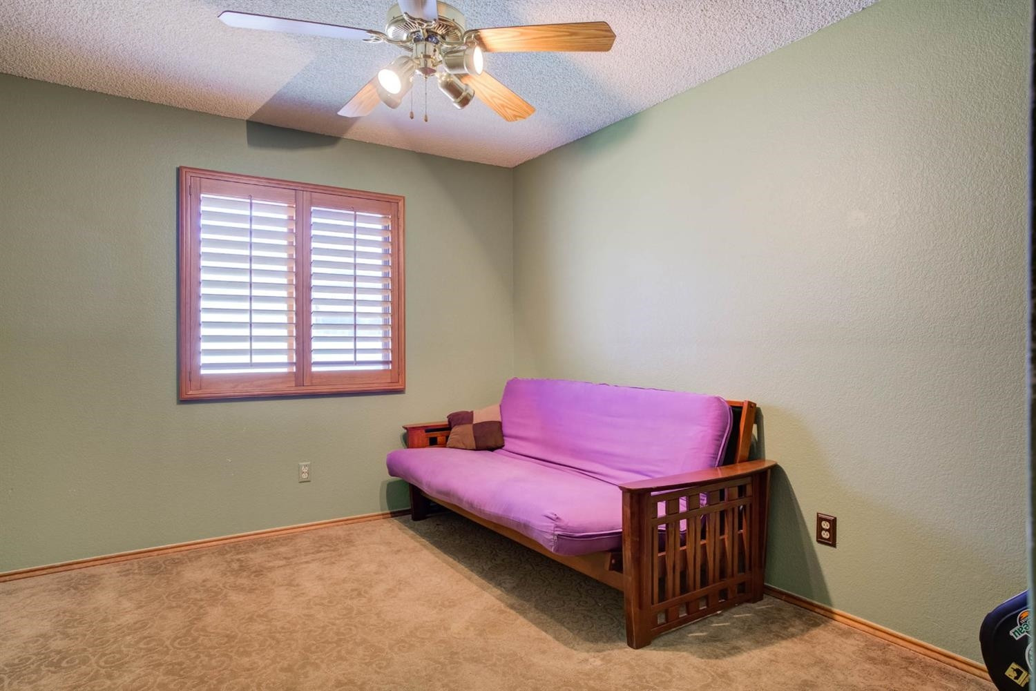 5304 90th Street Lubbock, TX 79424 - Photo 30 of 39 a spacious bedroom with a bed and a window